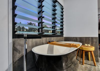 Pandanus House Ventilated Bathroom with Breezway Louvres Open