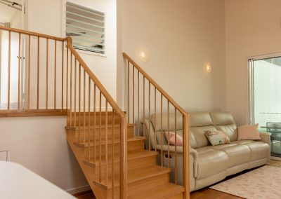 Beautiful handrails and staircase with Breezway Louvre Window