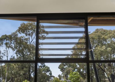 Close up of Breezway Powerlouvre System with clear views outside