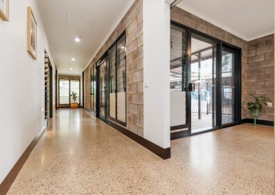 Multiple bays of Breezway Louvres help naturally ventilate the living areas in Somervile Houses