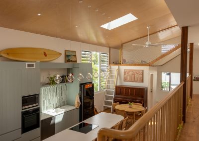 Overlooking the kitchen area with Breezway IGLU Louvre System and play area