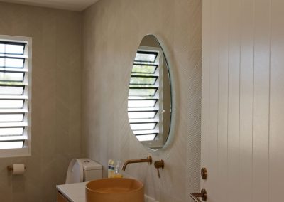 Reflection of Breezway IGLU System in bathroom mirror
