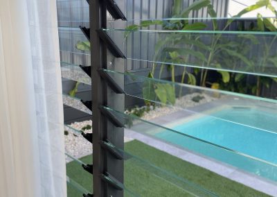 Clear views through Breezway Louvres to the pool area at the La Casa Eden Display Home