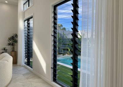 Enjoy outdoor views through Breezway Louvre Windows featured inside the La Casa Eden Display Home