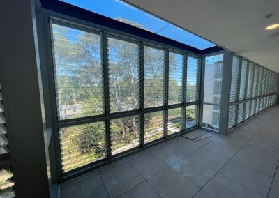 Multiple bays of Breezway Louvre Windows with Glass Roof