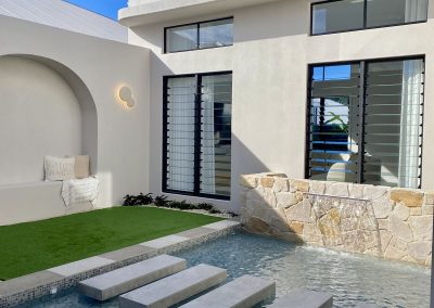 Outdoor entertaining area at the Ultra Living La Casa Eden Display Home featuring Breezway Louvres
