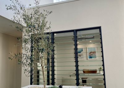 Views to study through Breezway Louvres at the La Casa Eden Ultra Living Display Home