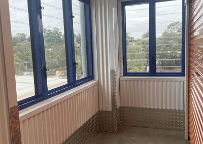 Kennards Storage with multiple bays of Breezway Innoscreen Louvre System
