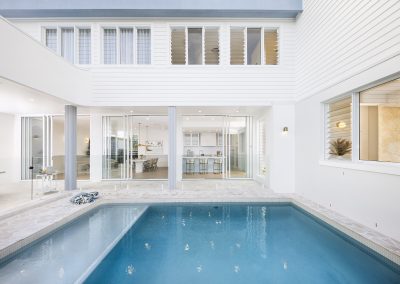 Outdoor area with pool and Breezway Louvres at BLK 43