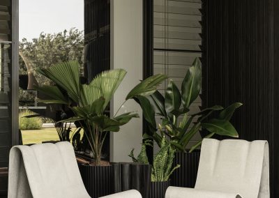Outdoor seating area of Blackwood Doonan featuring Breezway Louvres